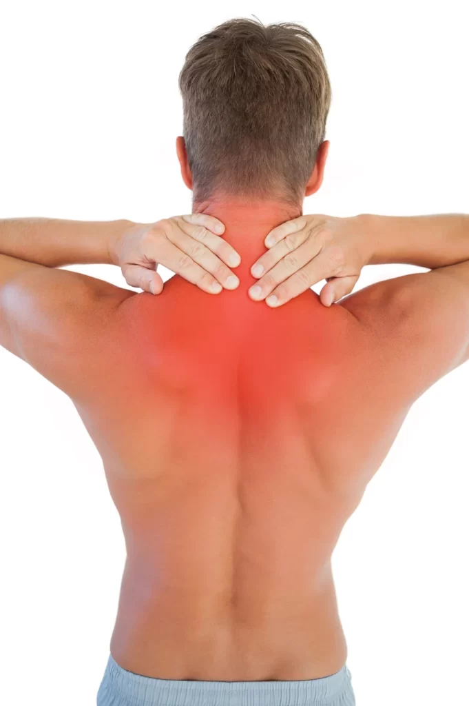 a man suffering from upper back pain
